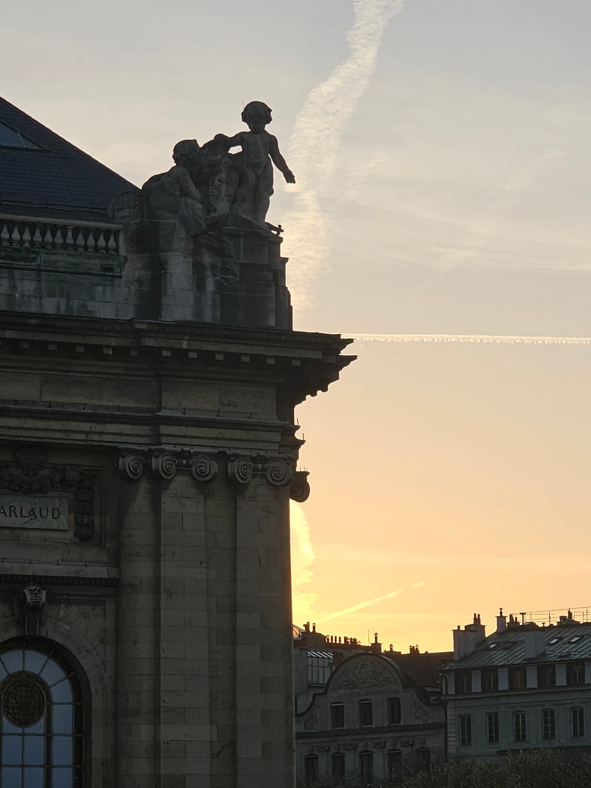 A corner of the museum of art and history of Geneva, against the backdrop of a sunset sky 