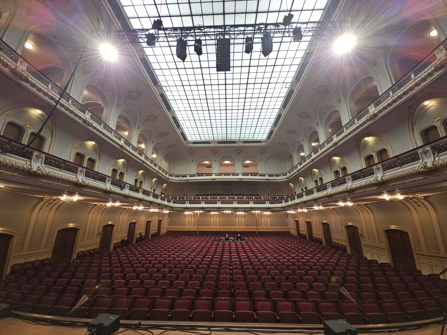 View of Laeiszhalle. Very grand, red seats, two balconies.